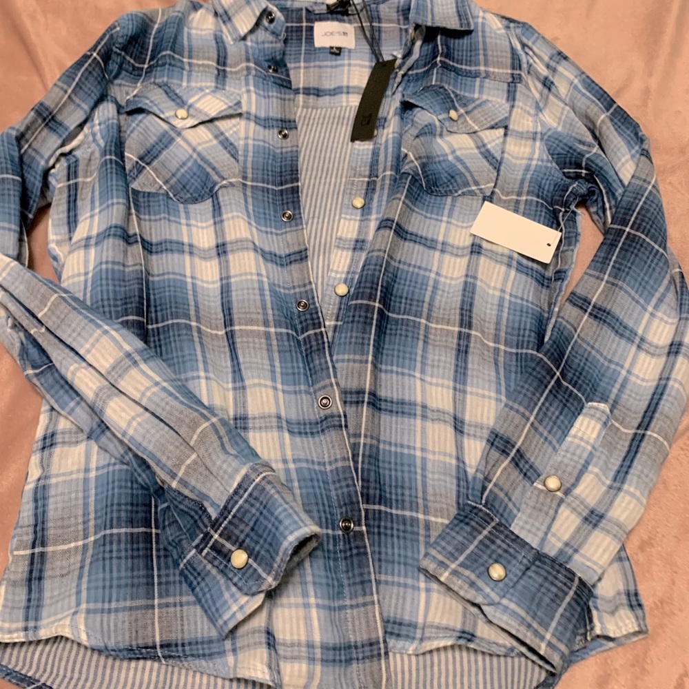 Joe’s pearl snap button up shirt.
